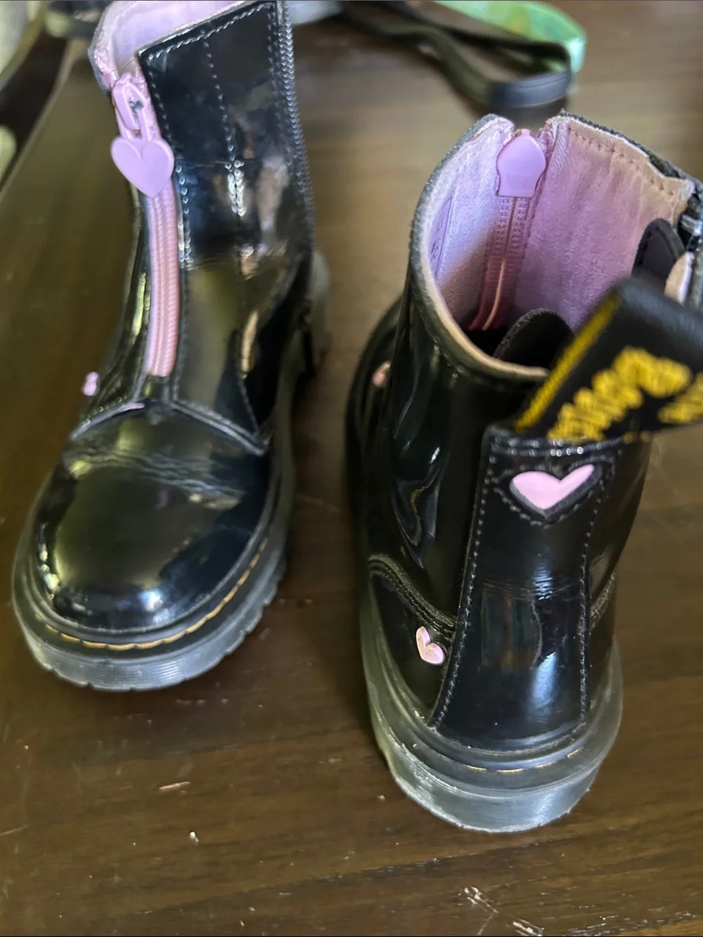 Dr. Martens Kids Black Patent Boots with Pink Trim and Pink Front Zip